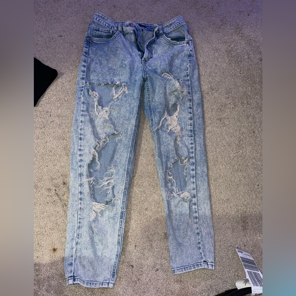 Ripped blue jeans